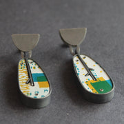 leaf shaped earrings in silver and printed aluminium in yellow and green  by jeweller Lindsey Mann