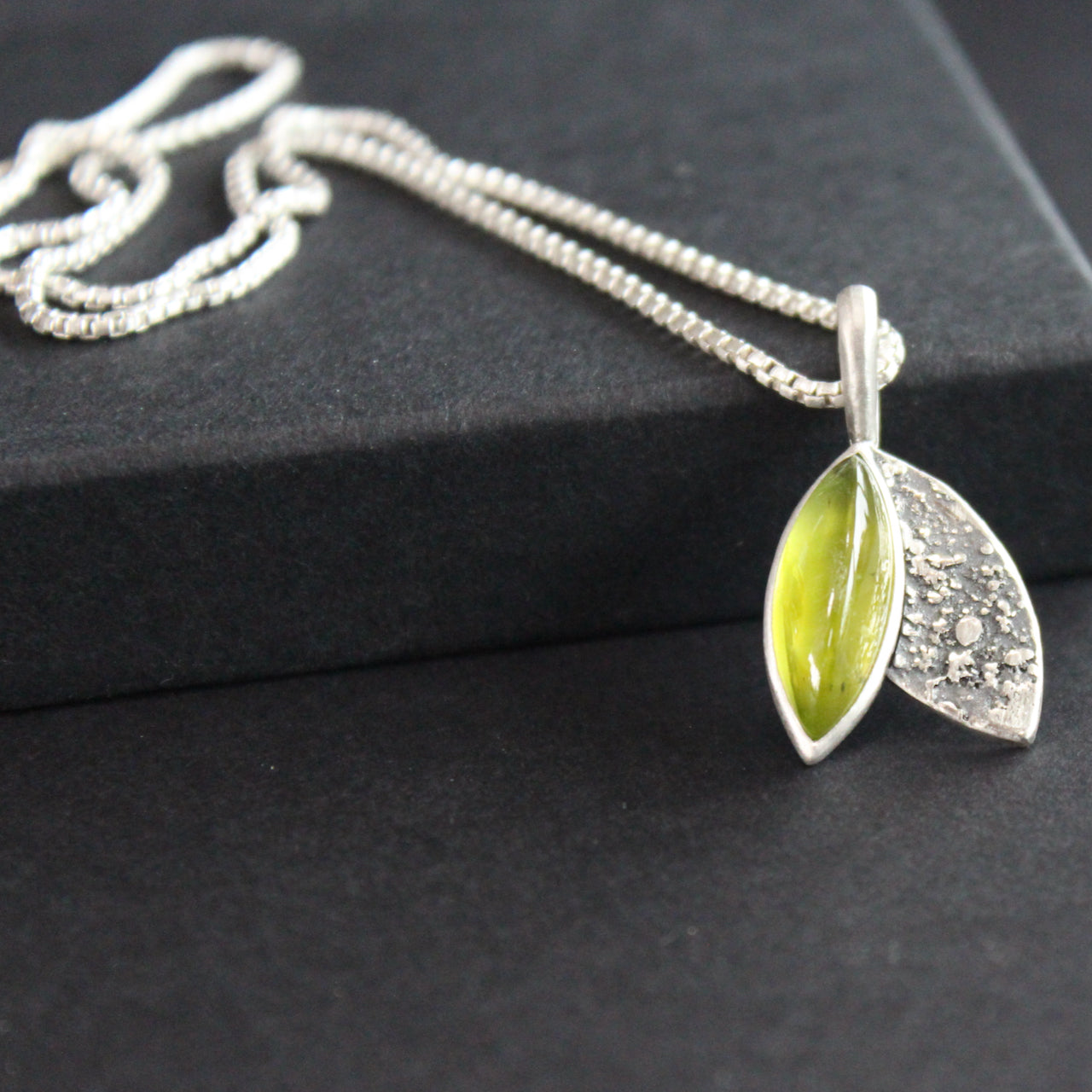 Carin Lindberg - Peridot and textured silver leaf pendant