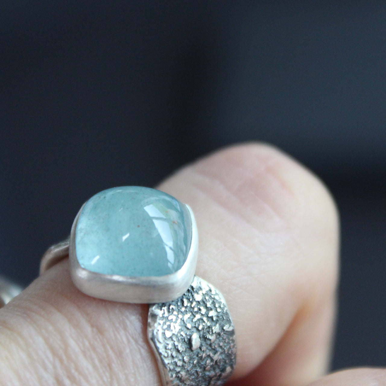 Carin Lindberg - Aquamarine ring in textured sterling silver women wearing on middle left hand finger