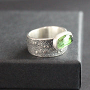 Carin Lindberg - Green tourmaline ring in textured sterling silver closeup on raised display box