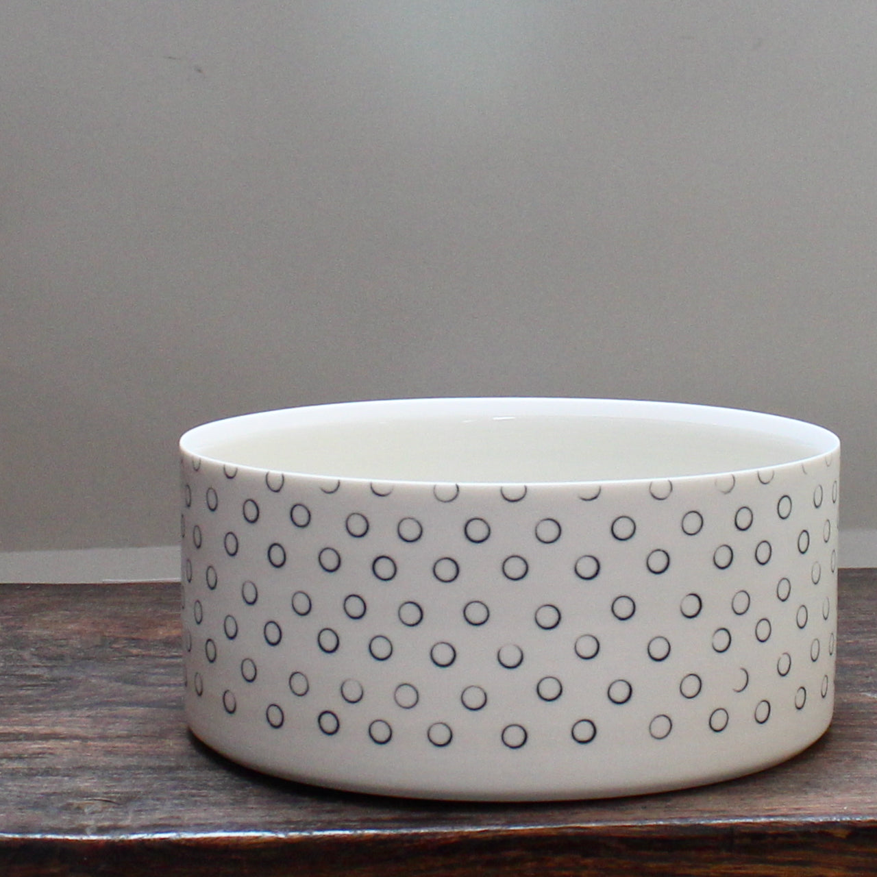 a dish decorated with dark blue small circles.