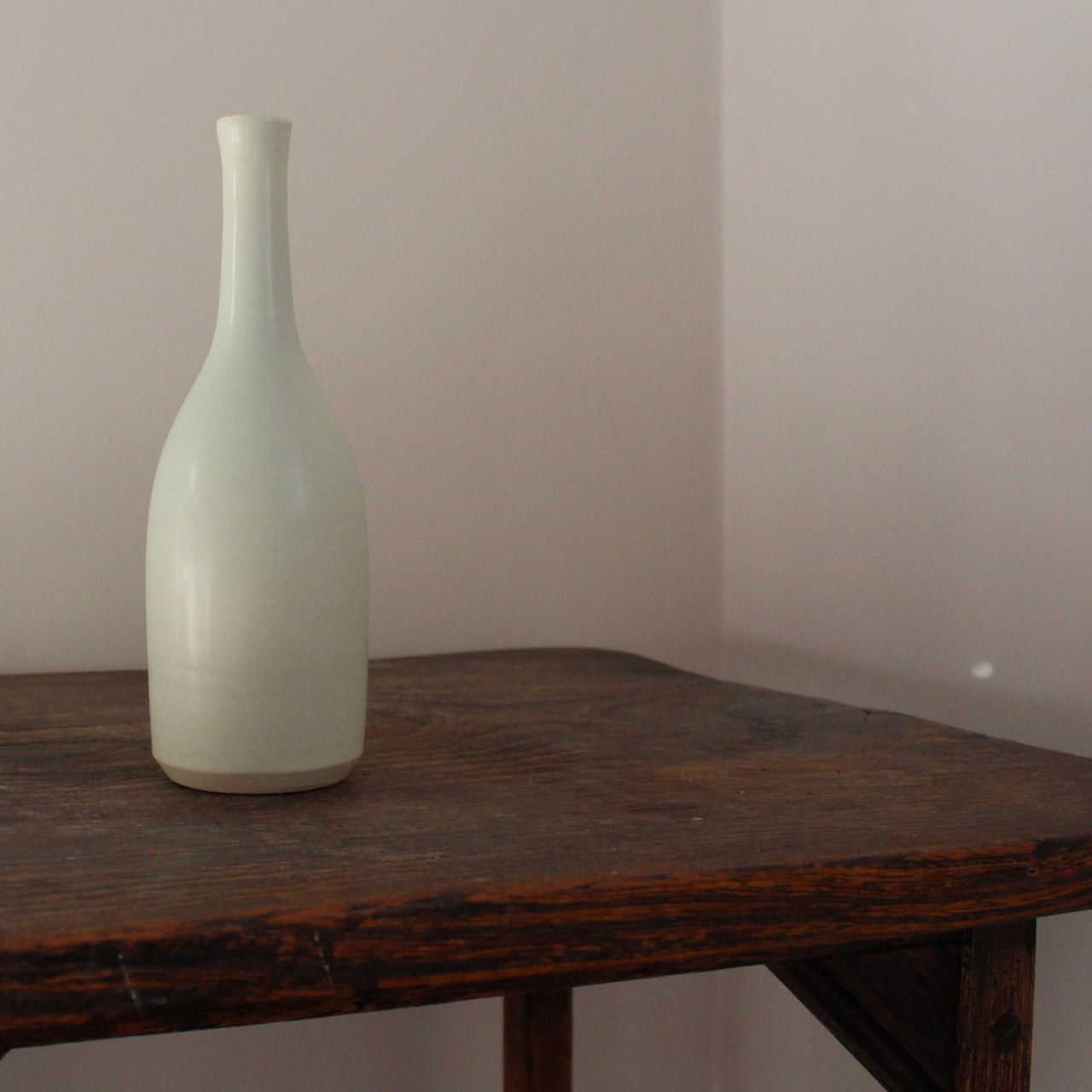pale aqua coloured ceramic bottle by English  ceramic artist Lucy Burley
