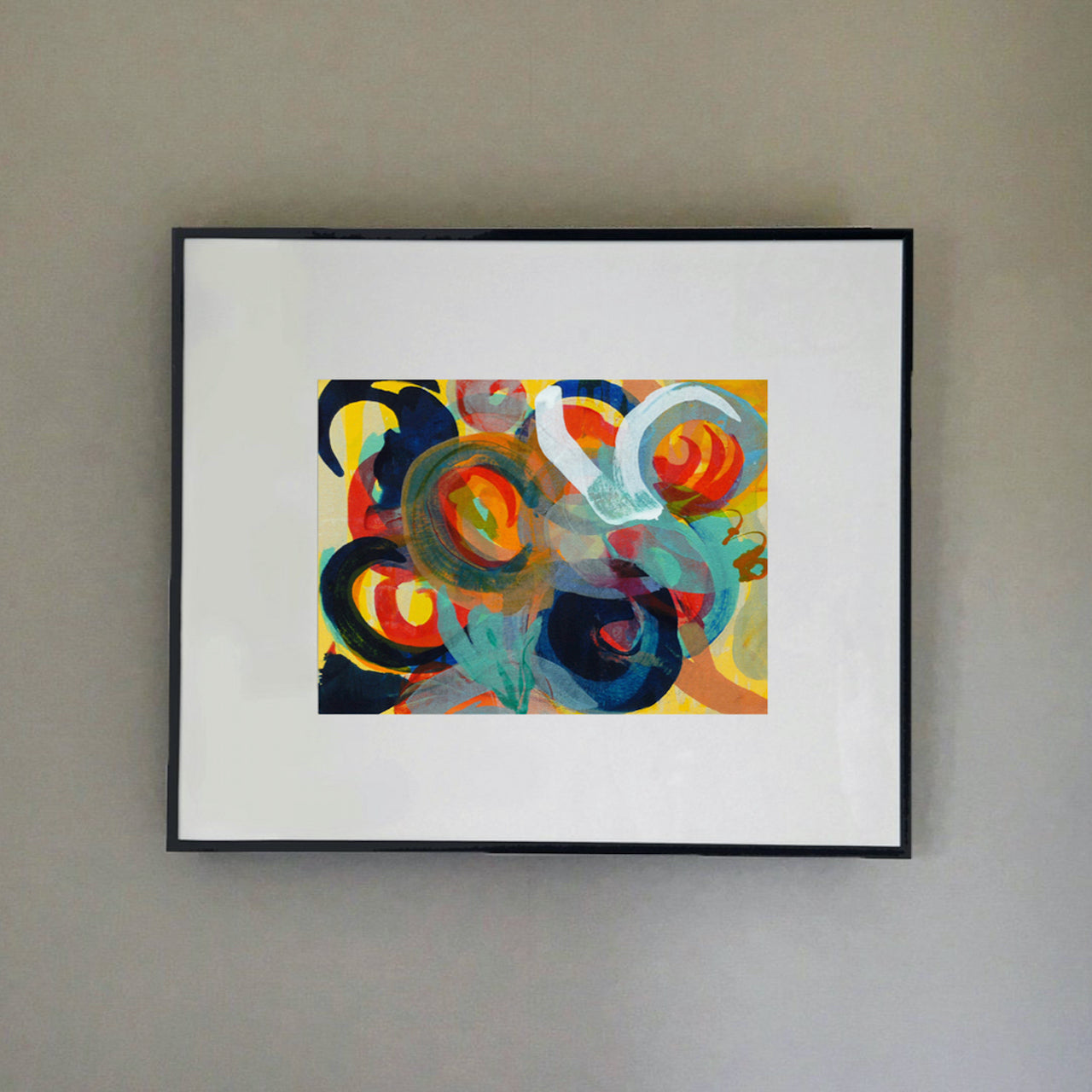 Abstract piece with coloured circles in black, green, oranges and yellows by artist Ella Carty