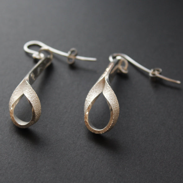 Drop silver earrings by artist Beverly Bartlett