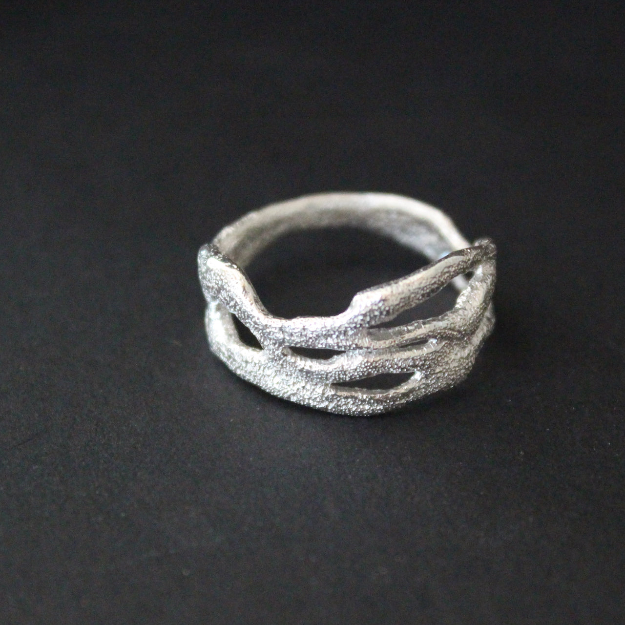 Organically hand sculpted silver Sea Siren ring, with delicate handcrafted surface detail by Cornish artist Claire Stockings-Baker.