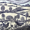 Lino print with blue and gold printed fields, trees and birds by artist Claire Armitage