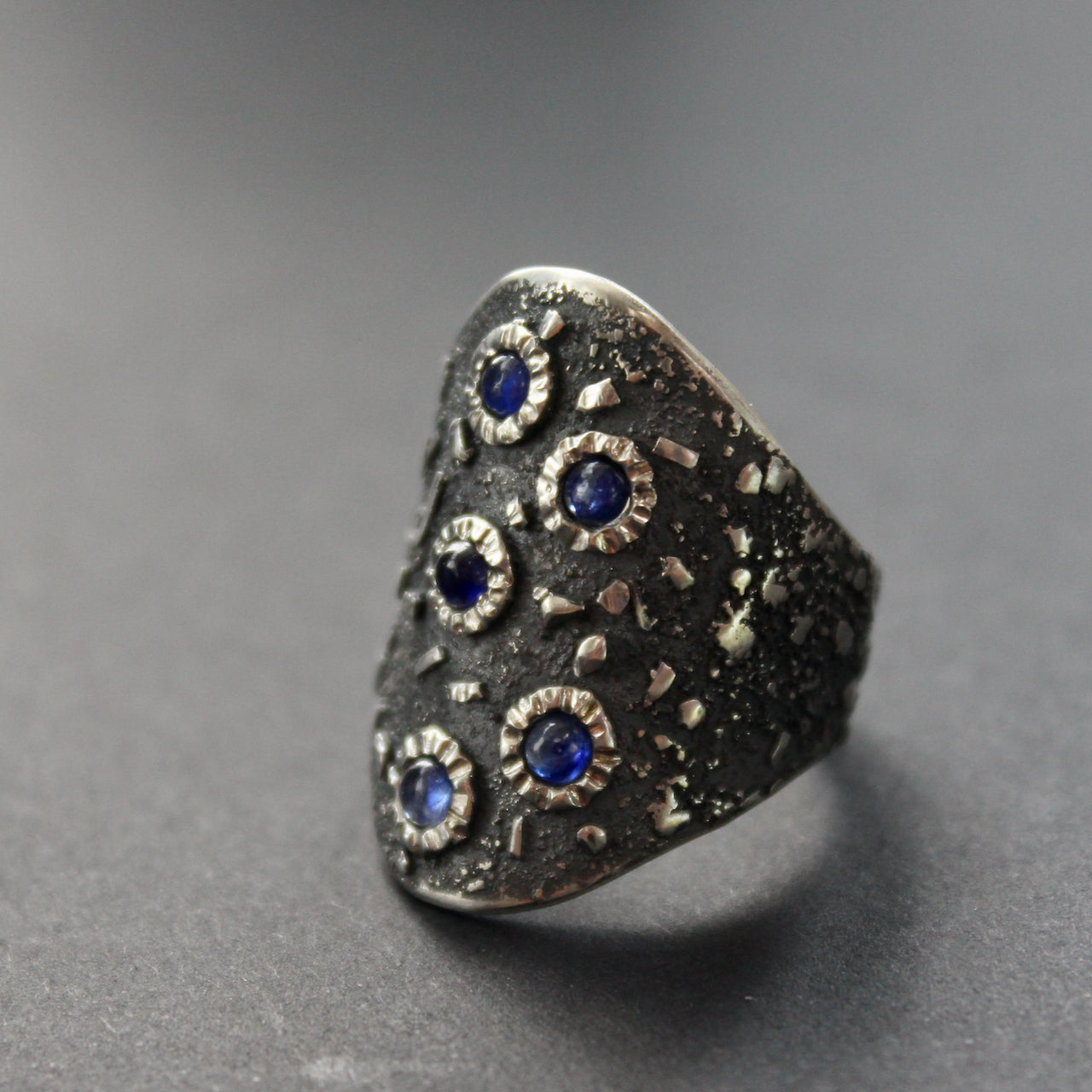 large textured silver ring set with blue sapphires by Carin Lindberg, UK jewellery designer 