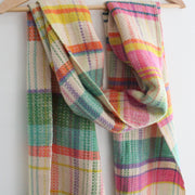 A Teresa Dunne handwoven in Cornwall lambswool scarf in cream, pale green, pink and yellow 