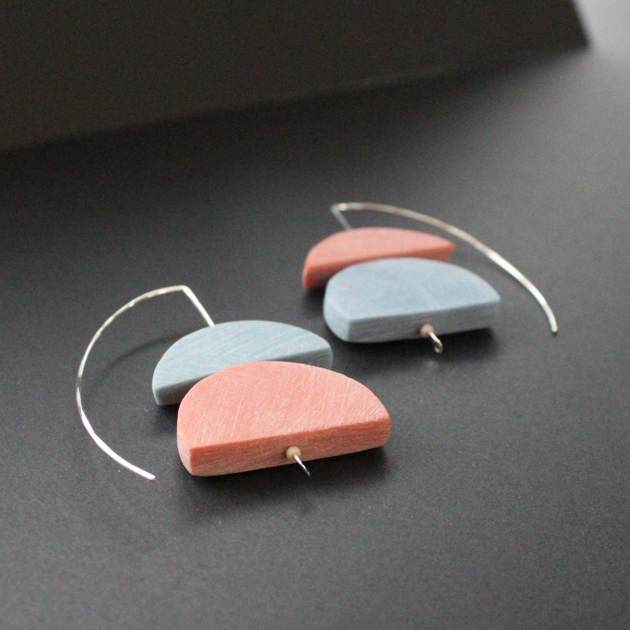 Drop earrings with Indigo and Rouge Ercolano by artist Clare Lloyd.