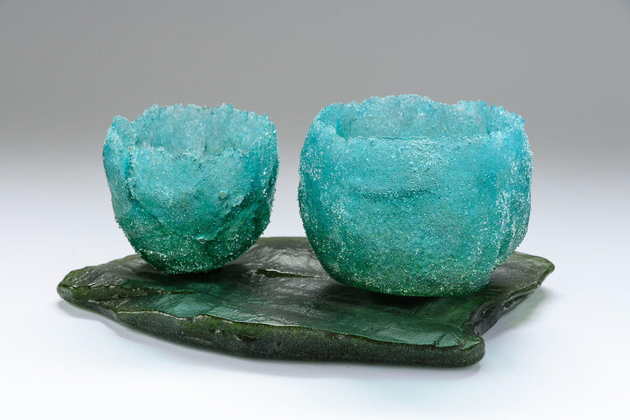 Smaller aquamarine textured glass vessel by artist Caroline Reed