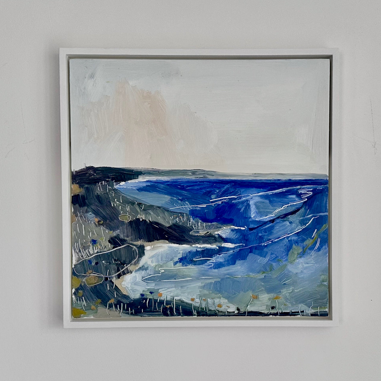 Seascape painting of Rame peninsula in tones of blue, whites and greys by Aimee Wilcock.