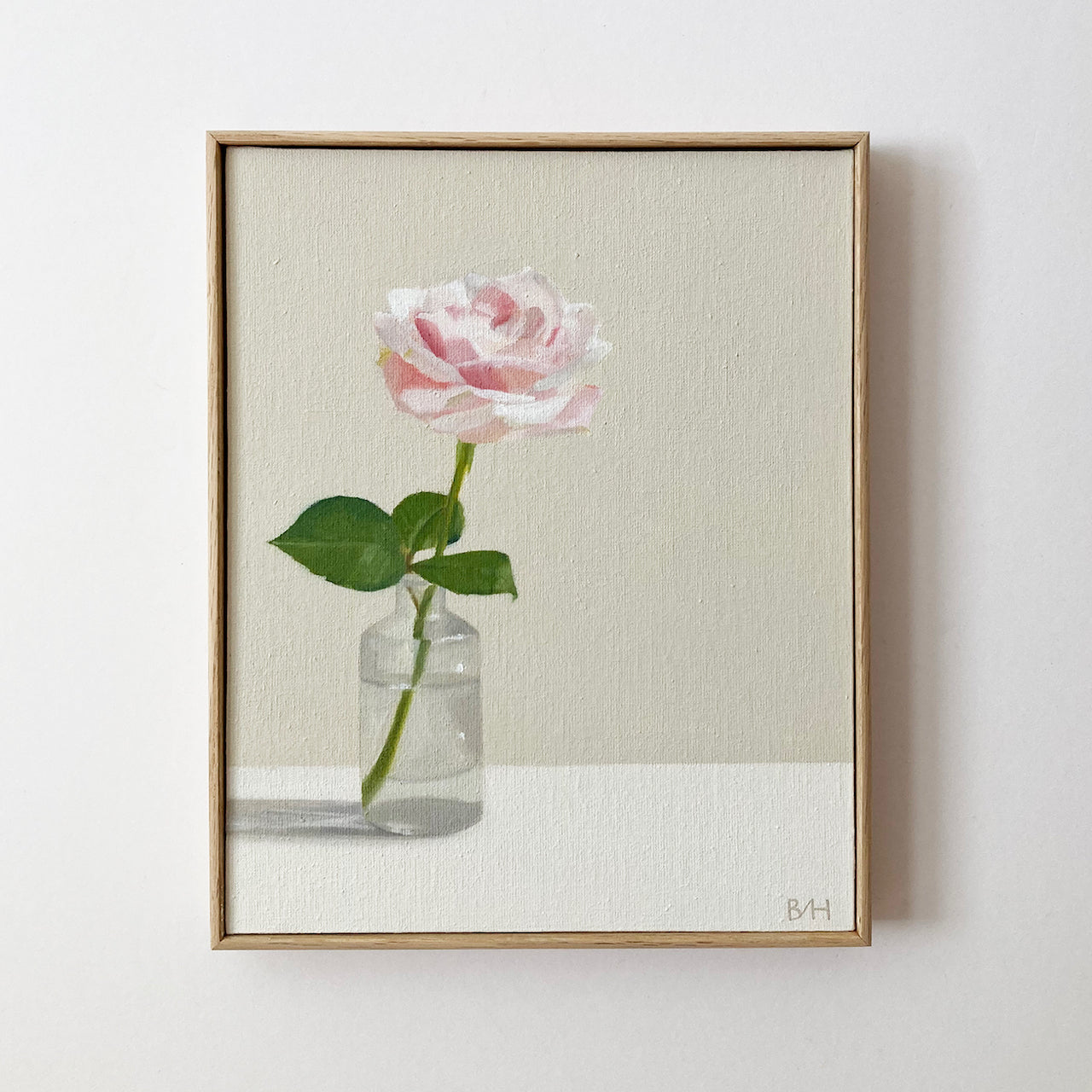 Neutral background with painting of white/pink single stem rose in a vase by artist Bess Harding