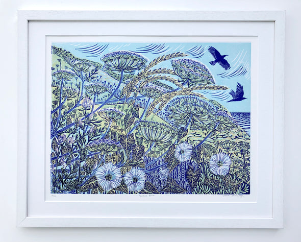 Cornish artist Claire Armitage, lino print with blue and yellow tones foliage, birds, and ocean in the background