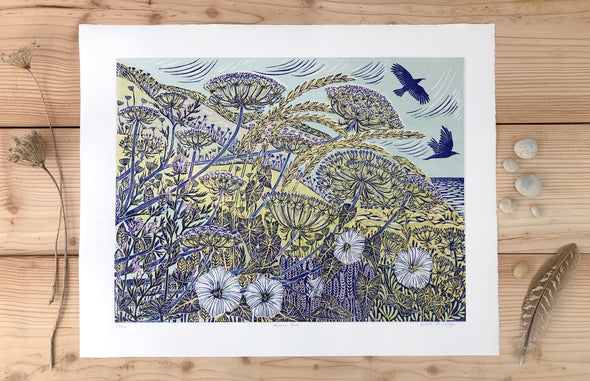 Cornish artist Claire Armitage, lino print with blue and yellow tones foliage, birds, and ocean in the background.