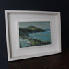 Imogen Bone, Cornish artist small landscape of grey, ochre & blue headland and ocean to the right
