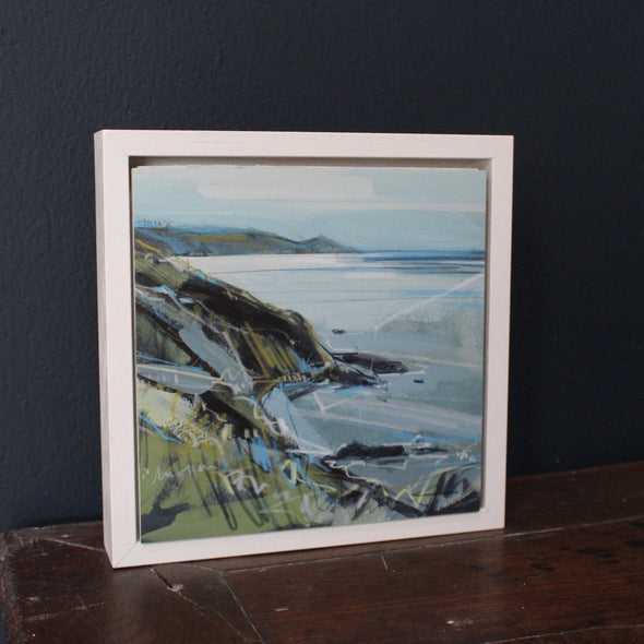 a small seascape by Imogen Bone of Rame Head in Cornwall  the cliffs are green, ochre and black and the sea is pale blue with hints of white and turquoise.