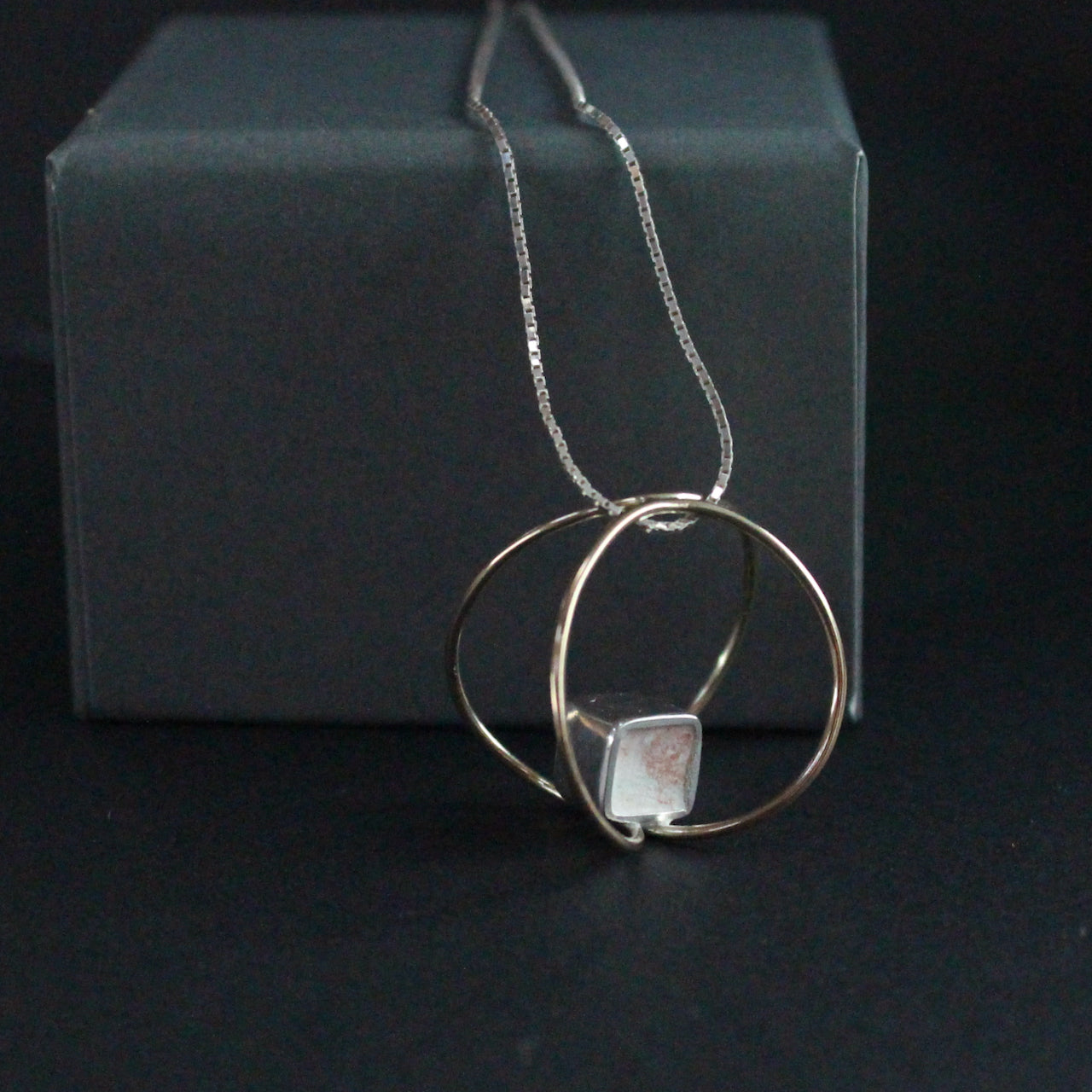 9ct gold and silver link pendant by artist Amy Stringer
