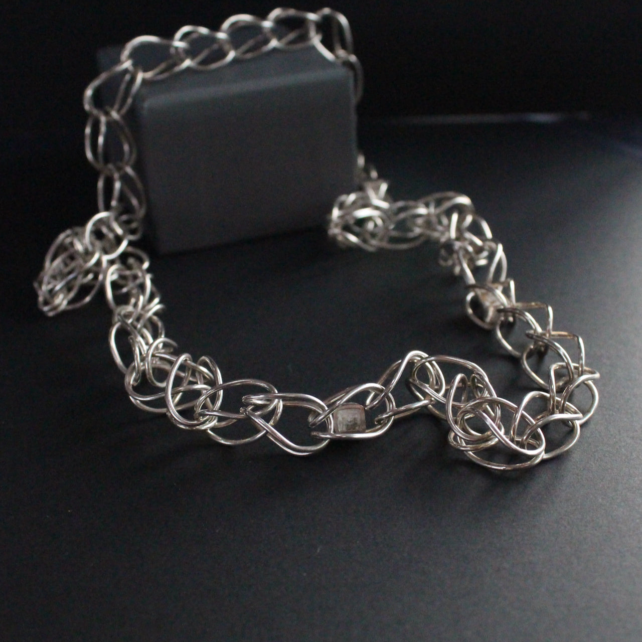 Sterling Silver loop in loop chain necklace by artist Amy Stringer.