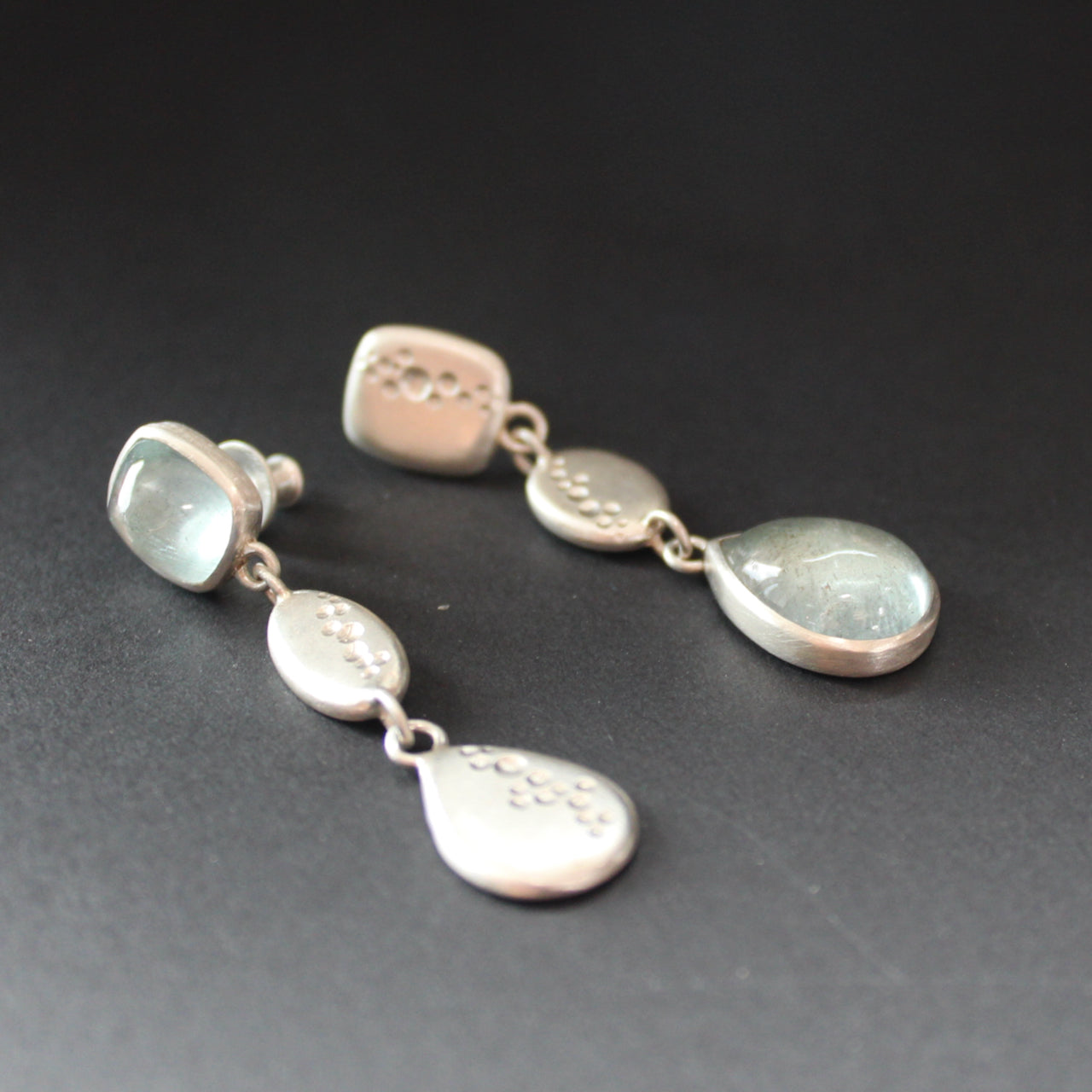 Carin Lindberg earrings of pale blue stones in silver drop setting