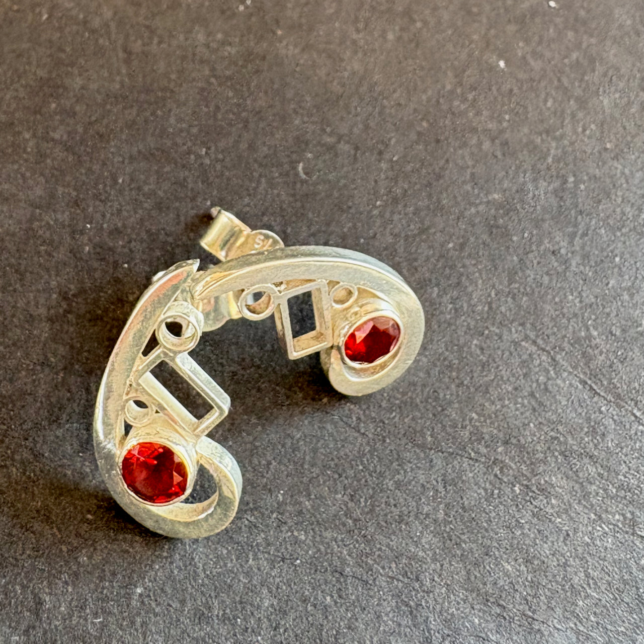 Beverly Bartlett - Cambium curve studs set with Garnet