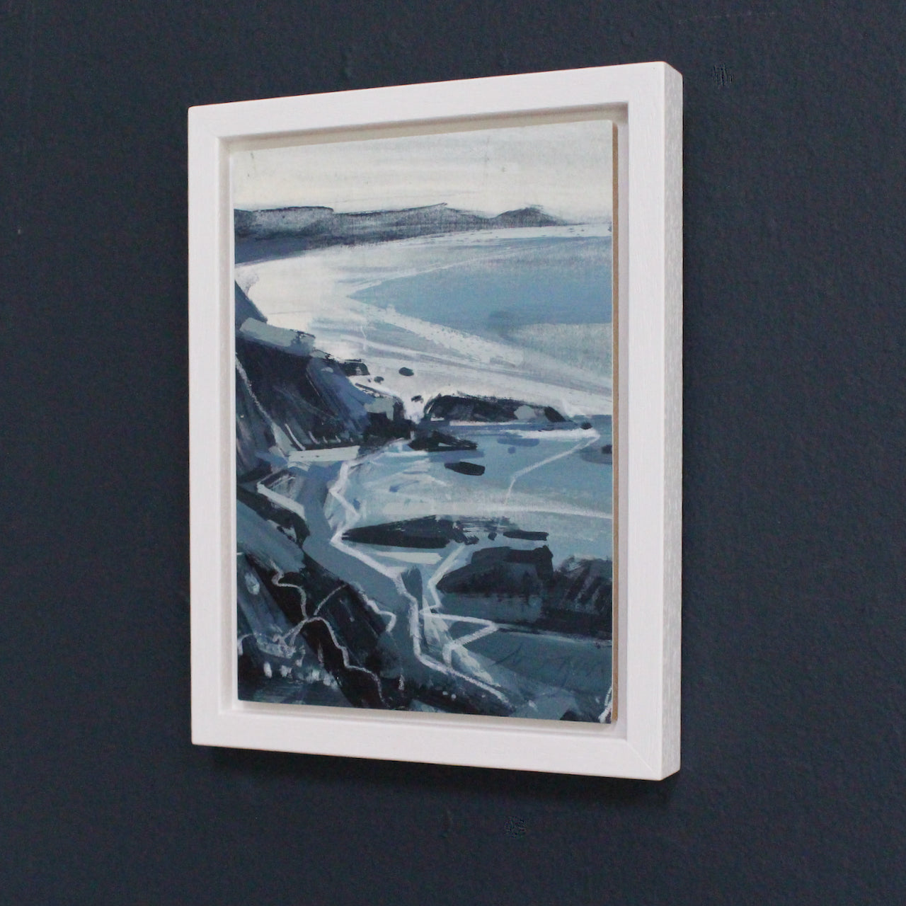 a small seascape painting of Rame Head in south Cornwall  by Cornish artist Imogen Bone the sea is shades of blue and white, the peninsula blue and grey.
