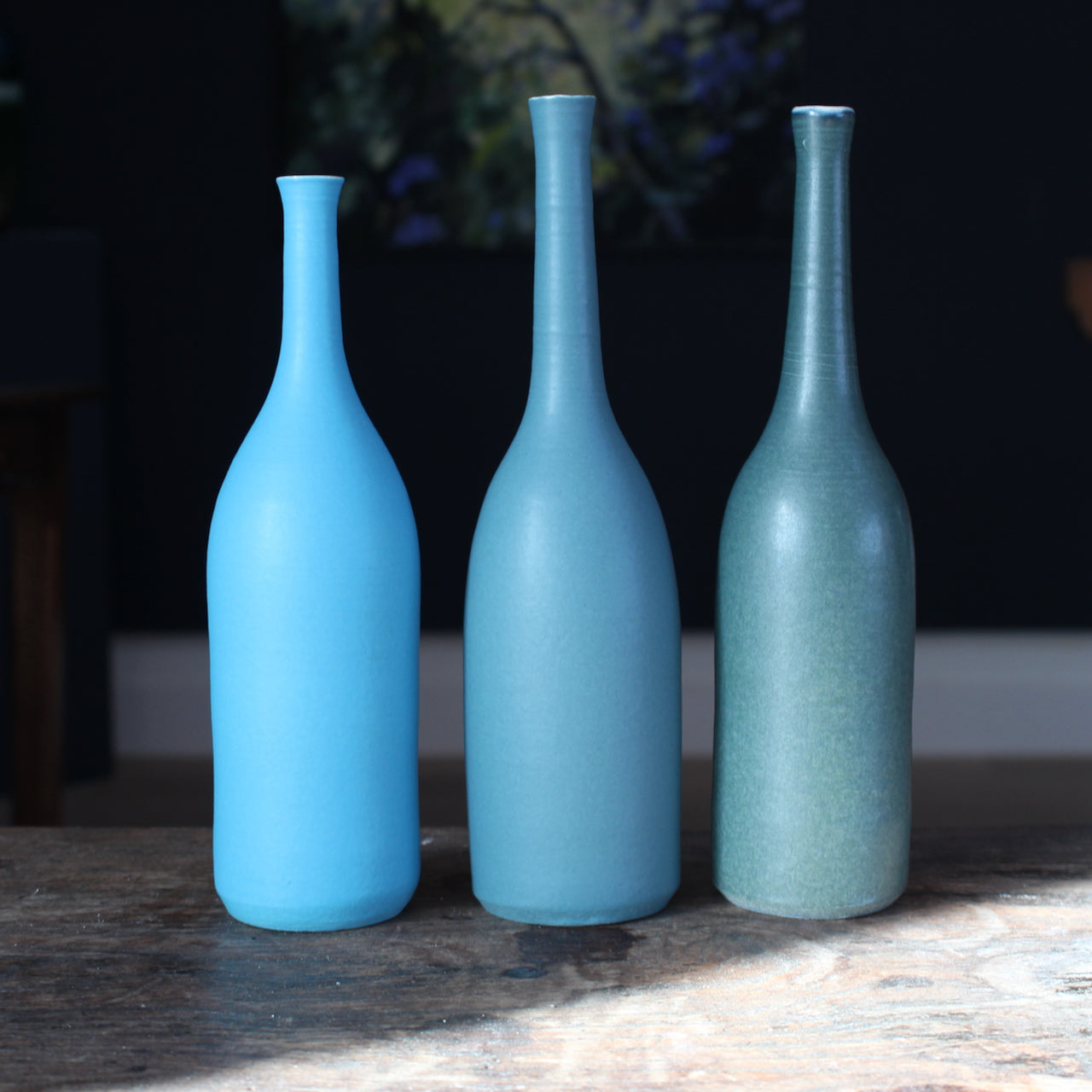 trio of  ceramic bottles in shades of teal and blue by UK ceramic artist Lucy Burley