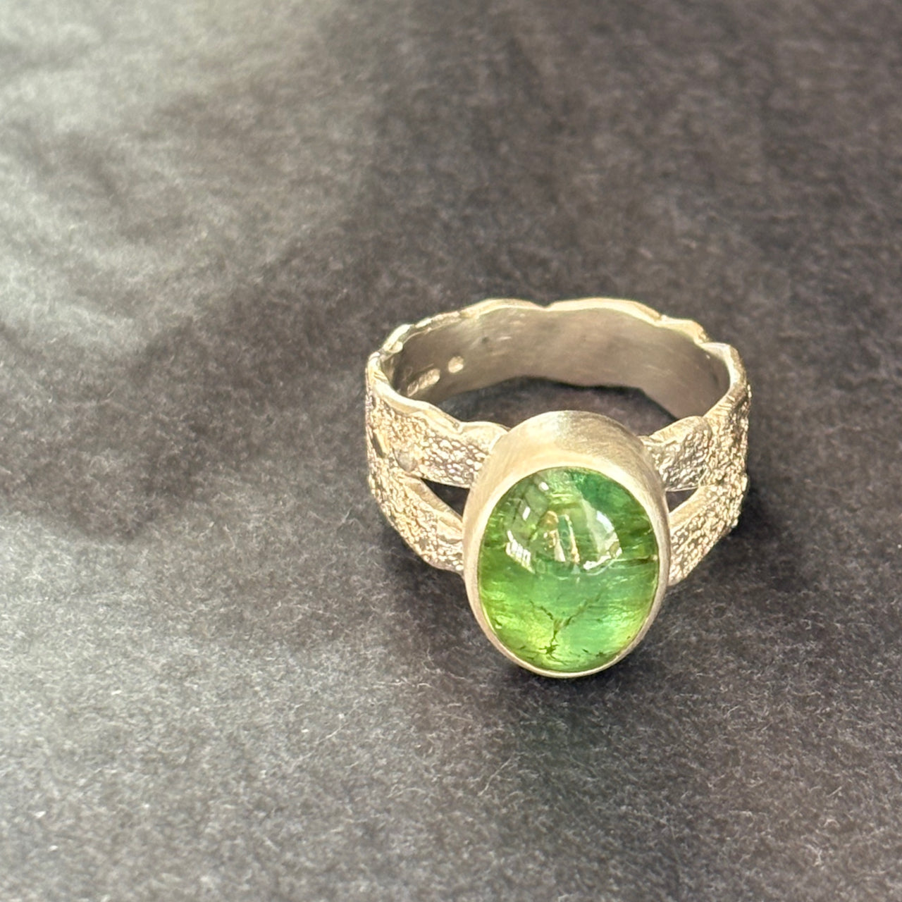 Carin Lindberg -  Green Tourmaline ring in textured sterling sliver ('portrait' setting)