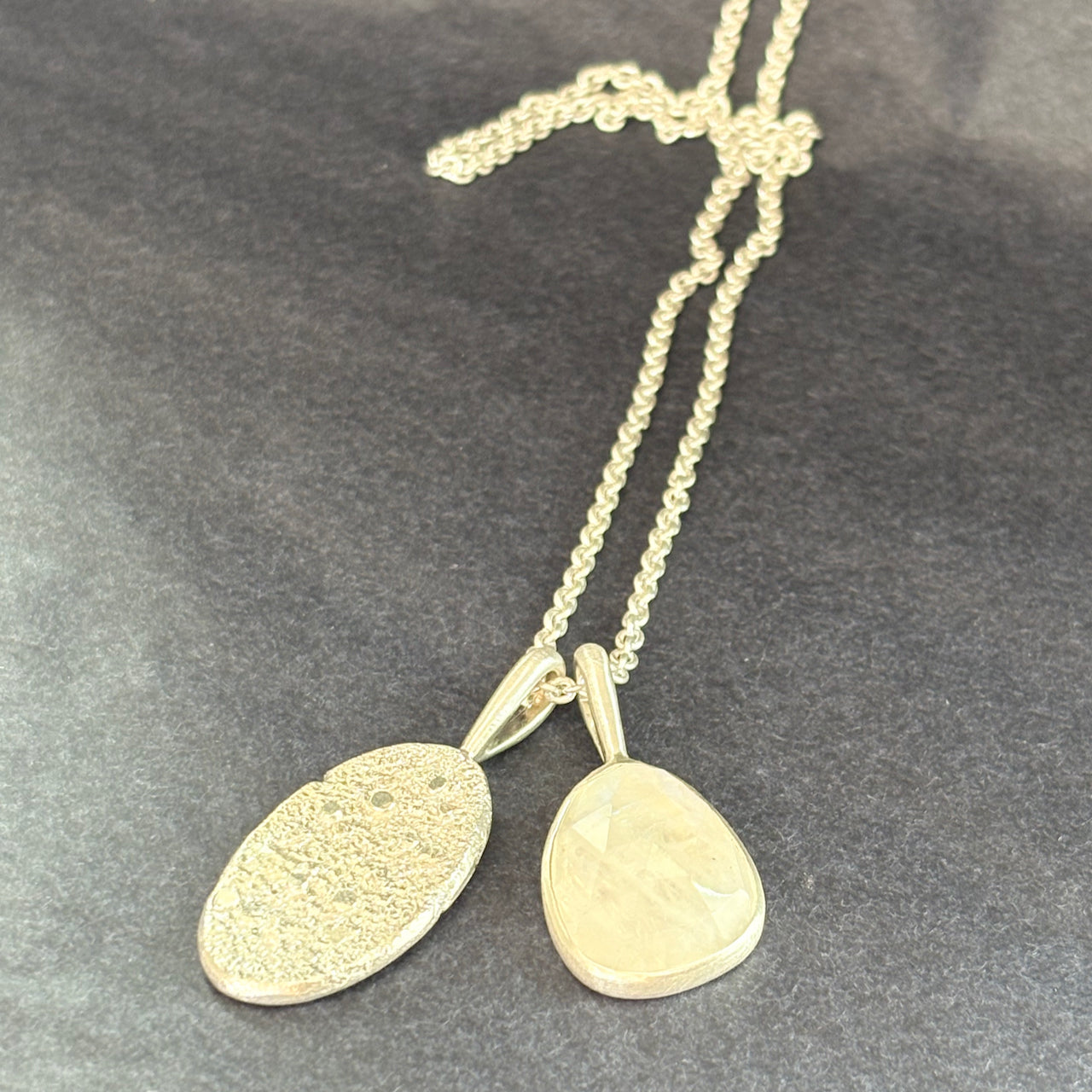 Carin Lindberg -  Rainbow Moonstone textured silver duo pendant