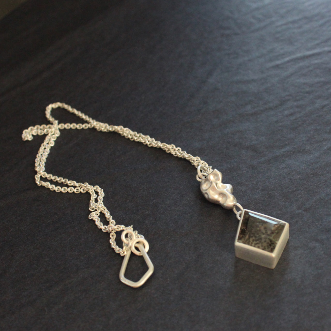 Carin Lindberg -  Included quartz molten pendant in sterling silver