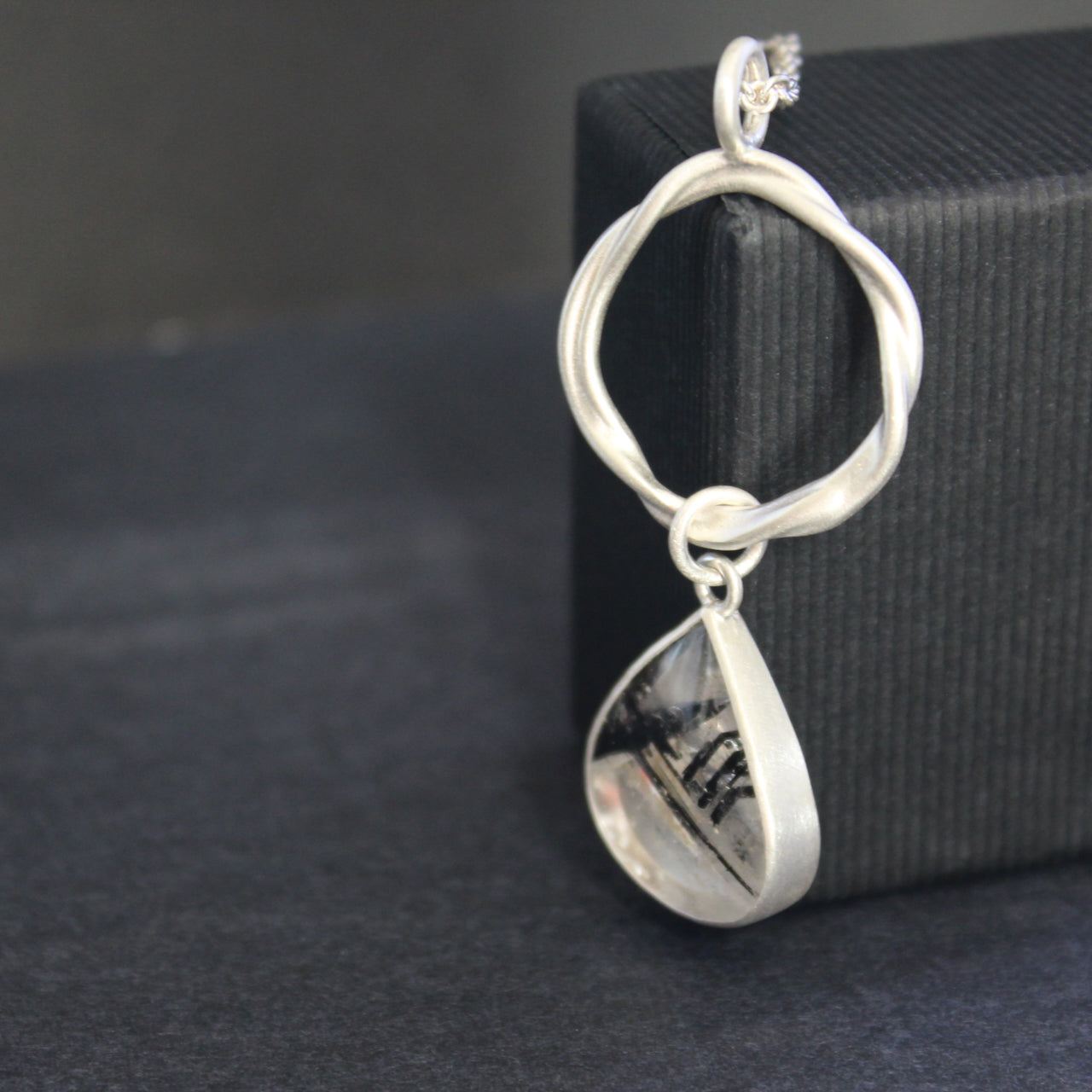 Carin Lindberg -  Tourmalinated quartz tangle pendant in brushed silver