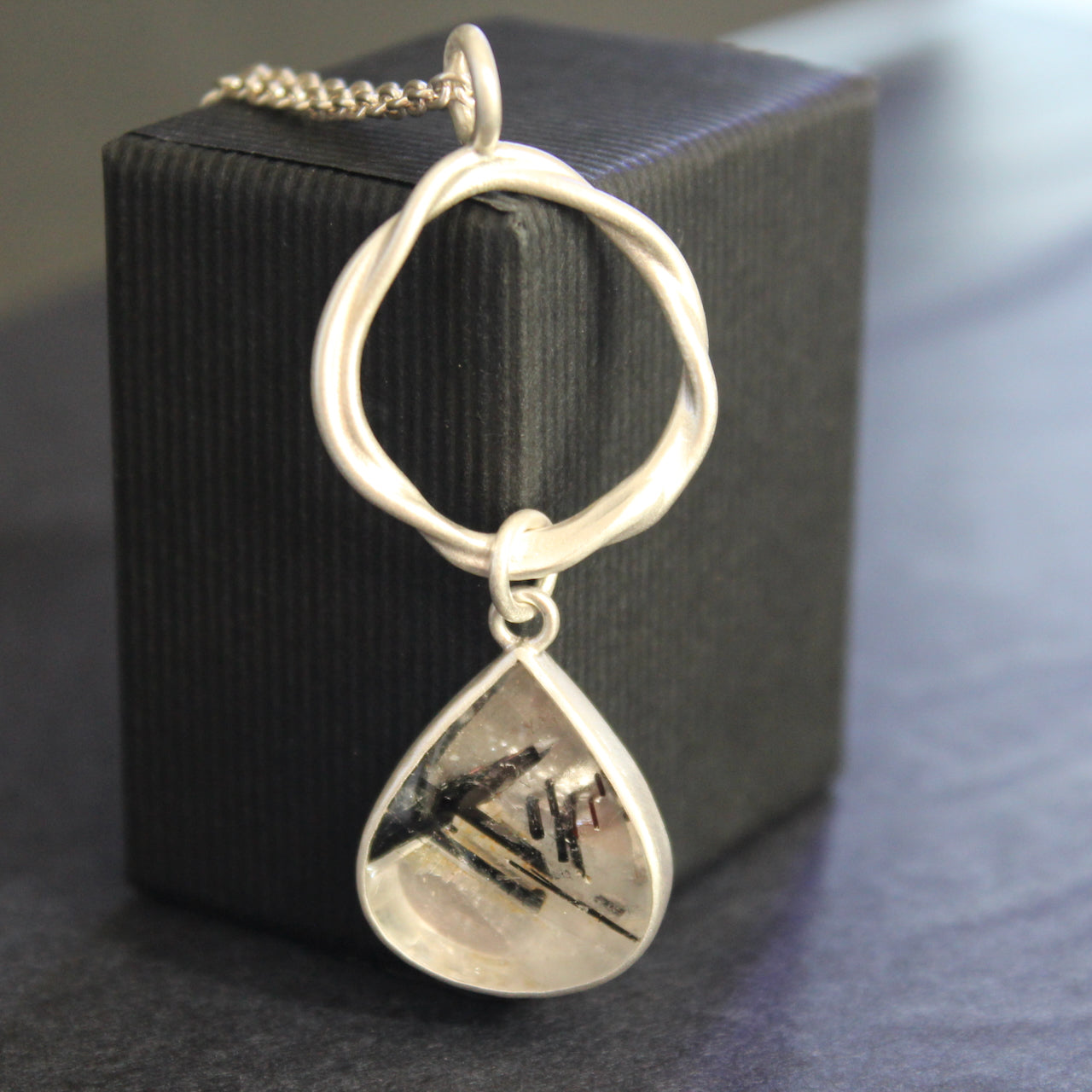 Carin Lindberg -  Tourmalinated quartz tangle pendant in brushed silver