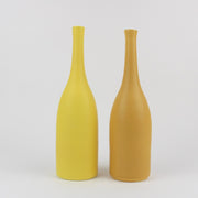  two yellow ceramic bottles by Lucy Burley, UK ceramicist. 