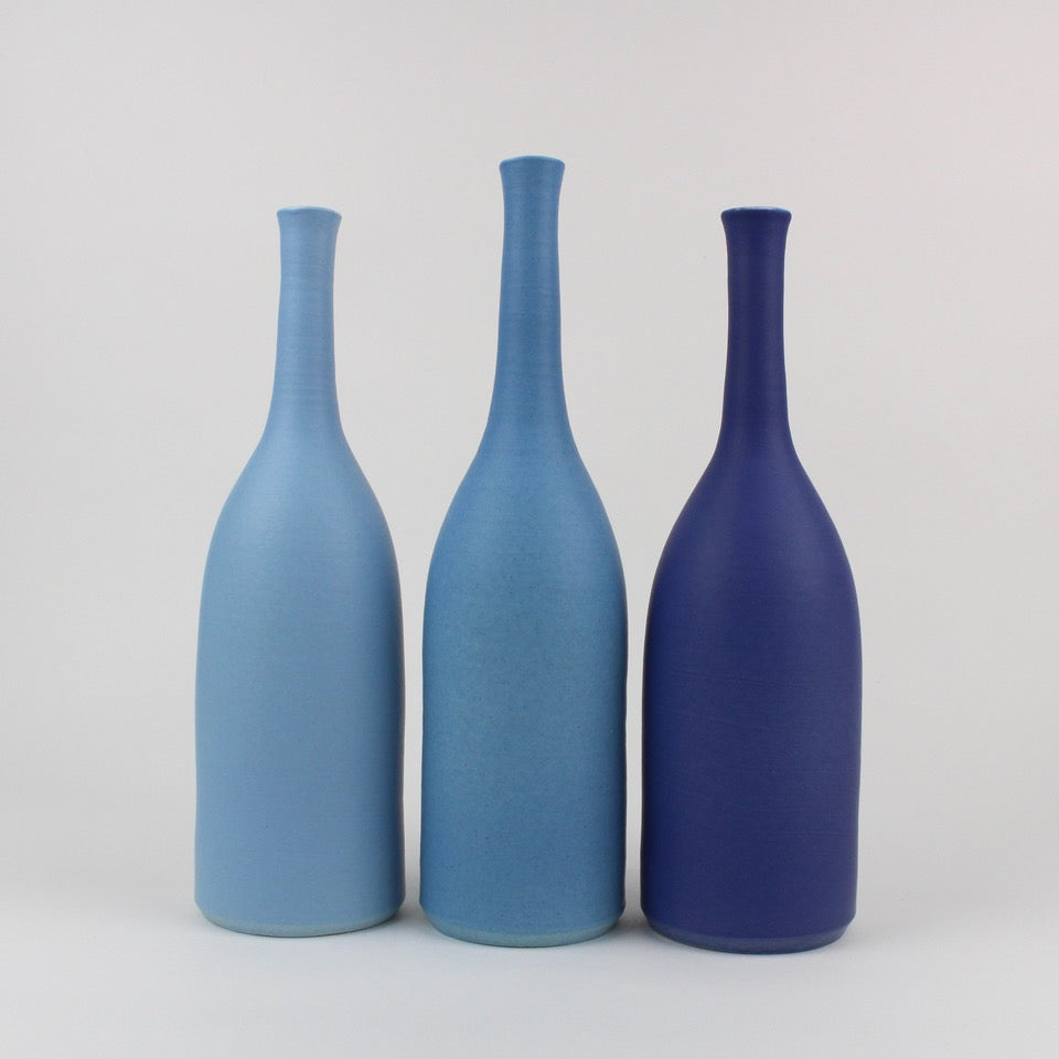 Lucy Burley ceramic bottle trio in shades of blue