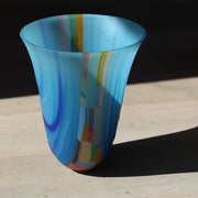 large blue vessel with multicoloured detail in the centre by Ruth Shelley, welsh glass artist 