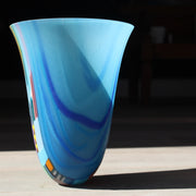 Ruth Shelley, welsh glass artist large blue vessel with multicoloured detail to the left hand corner
