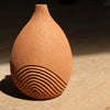 Artist Michele Bianco, hand carved, tinted stoneware medium sized mid terracotta bottle with line detail 