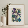 Framed Ink flower painting in tones of blue and ochre by artist Lucy Innes Williams