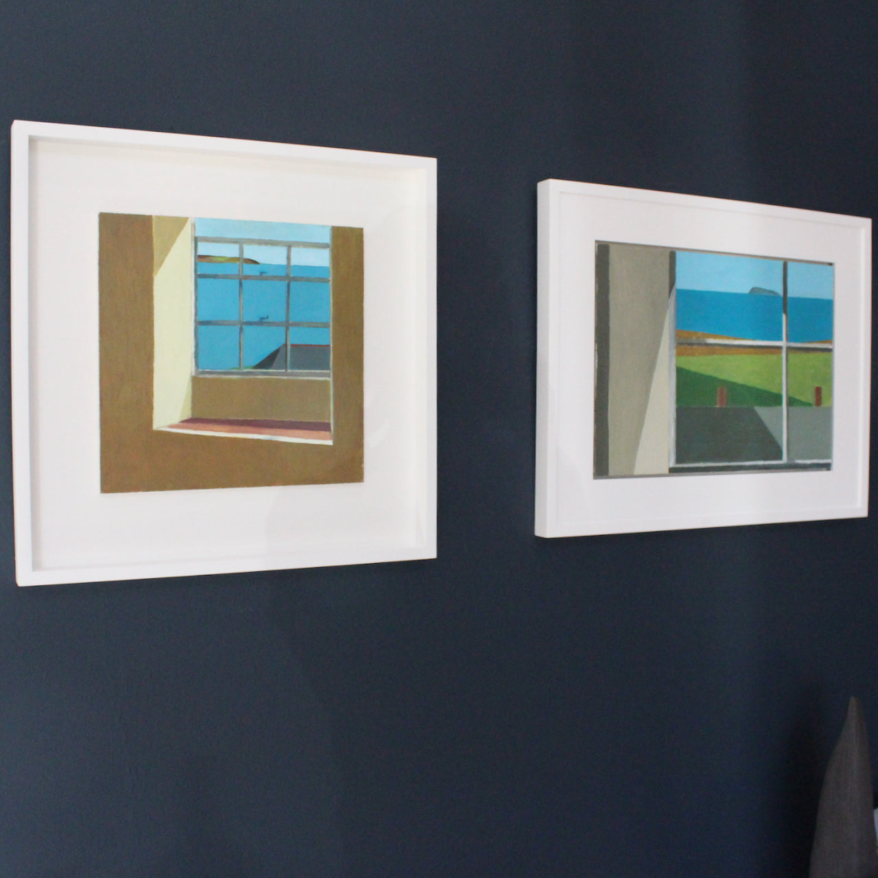 Painter Philip Lyons, framed painting of white wall with view through window panes to green grass area and blue coastline.