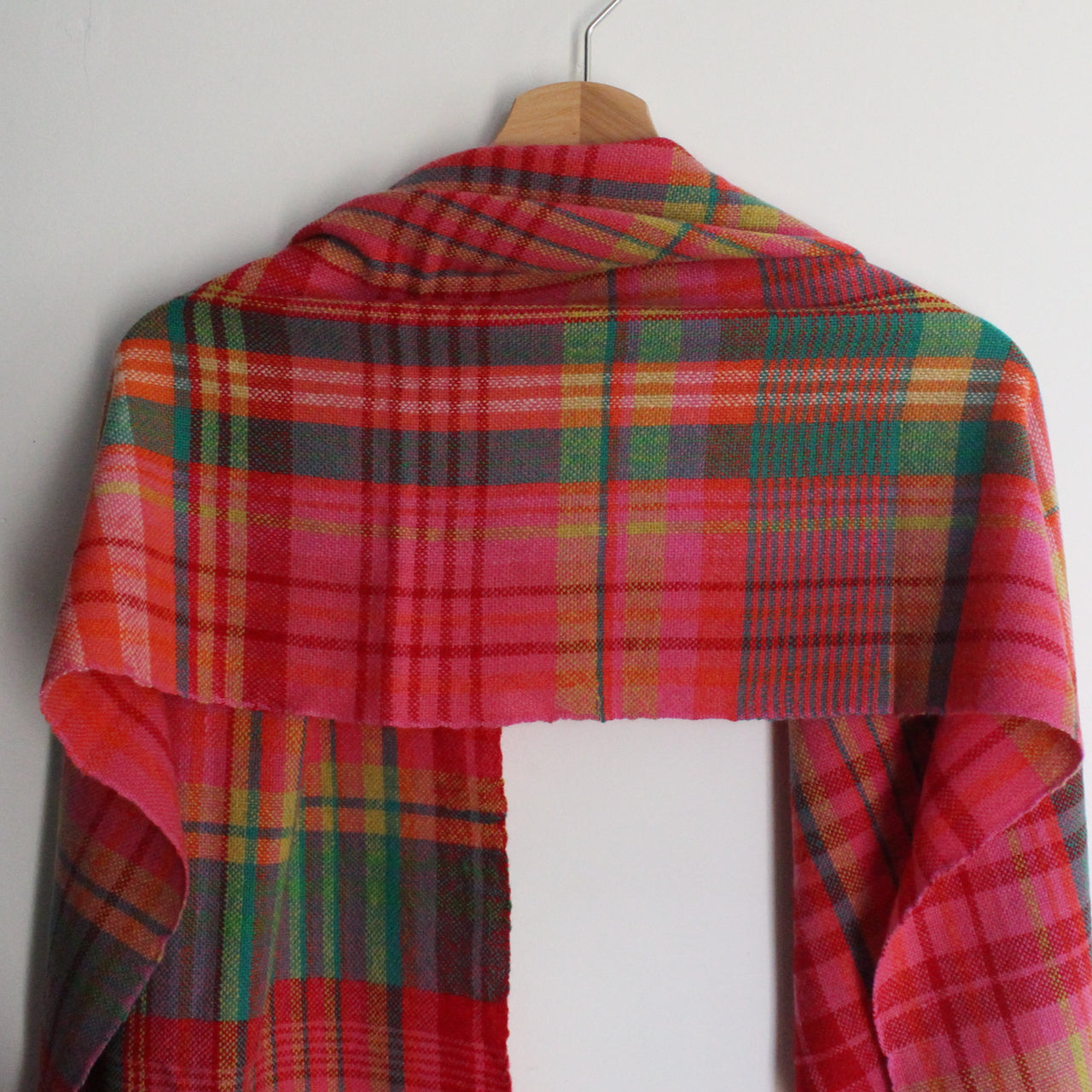 Teresa Dunne handwoven scarf in pinks, green, reds and yellows