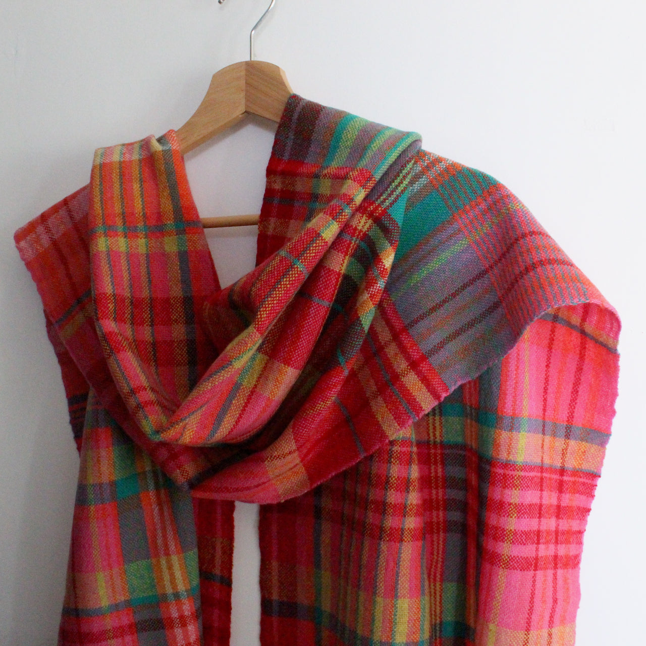 lambswool scarf in pinks, greens and yellow by Cornish textile artist Teresa Dunne