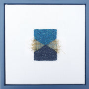 Abstract textile piece in tones of blue with textures ochre fibres by artist Jess Rippengale