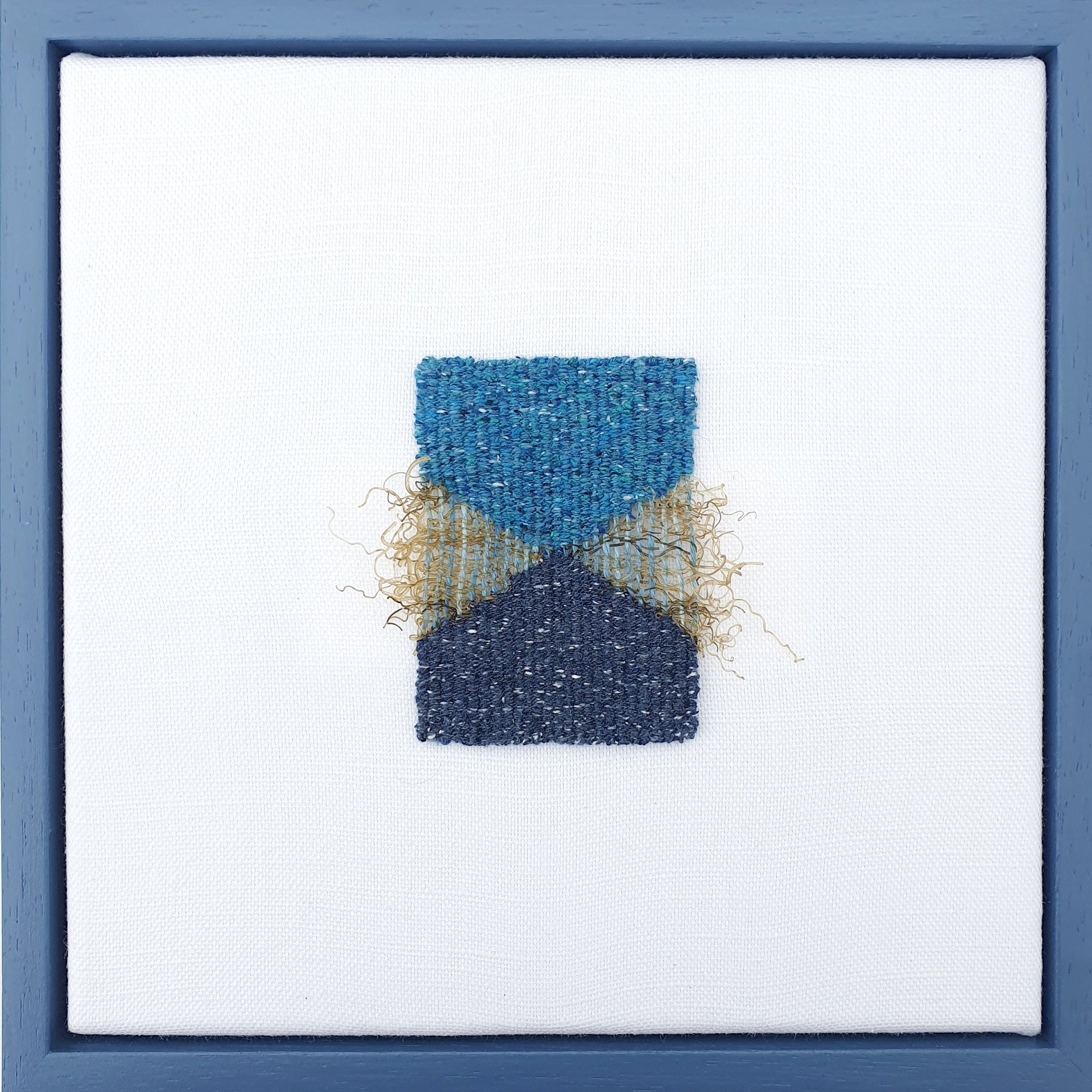 Abstract textile piece in tones of blue with textures ochre fibres by artist Jess Rippengale