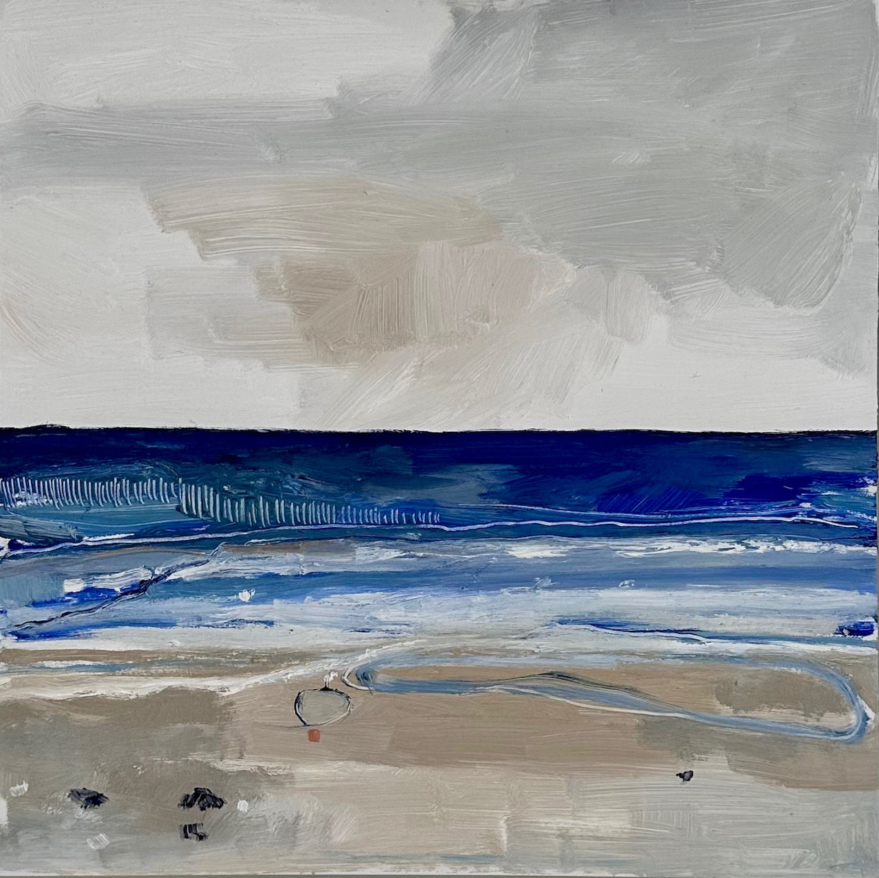 Seascape painting of shoreline with tones of blue sea, sand in foreground and light sky by Aimee Willcock