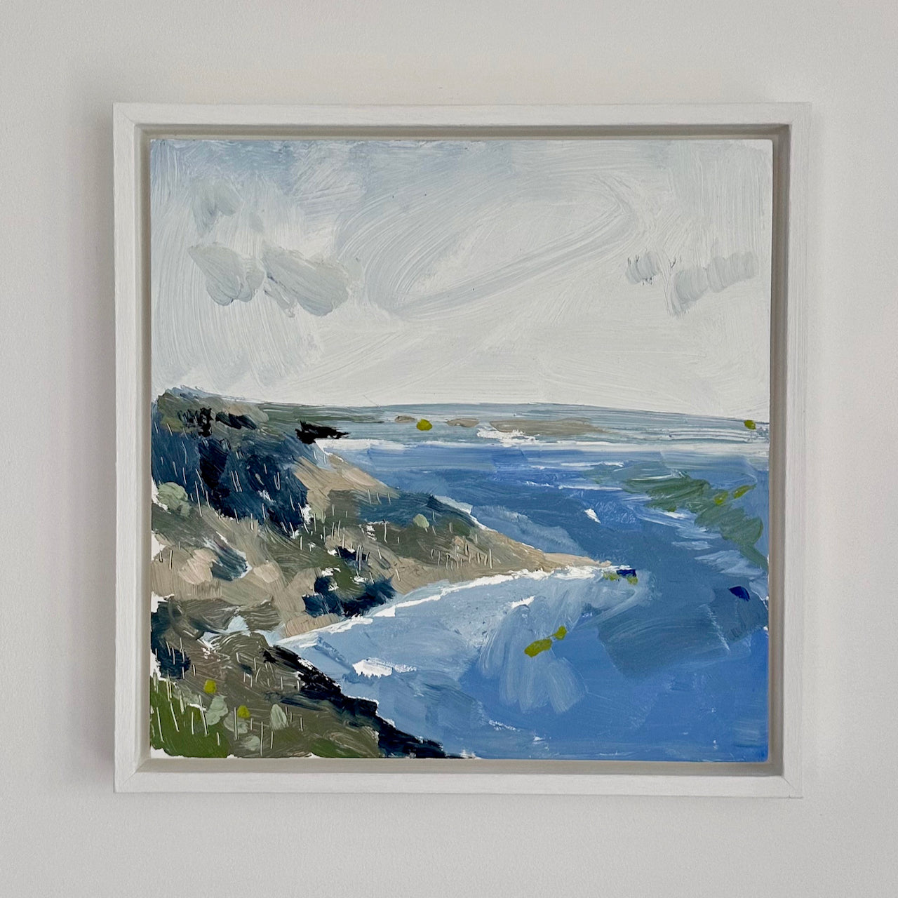 Seascape painting in tones of blue, grey, white and green of Polhawn by Aimee Willcock.