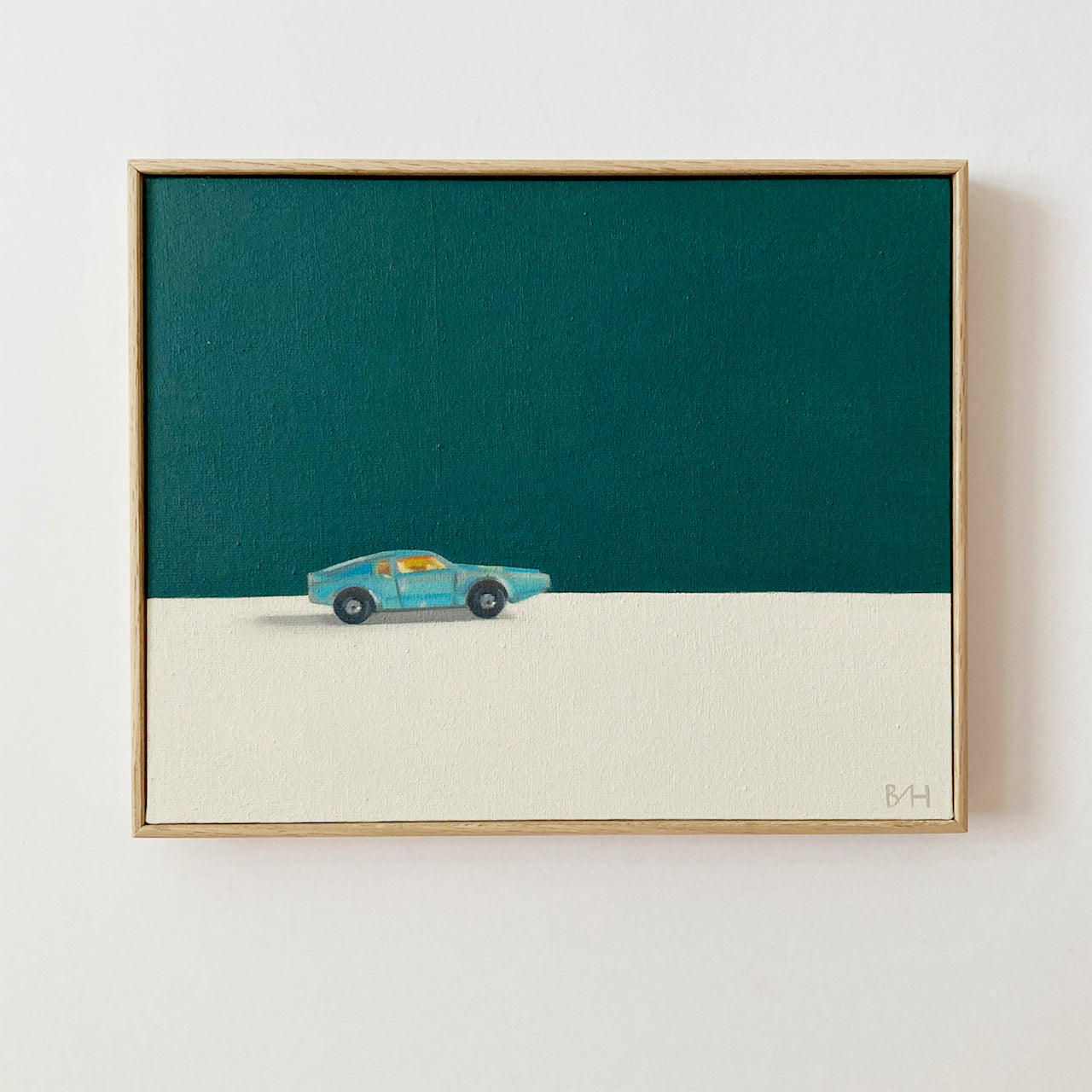 Blue and neutral background painting with single blue car driving from left to right by artist Bess Harding