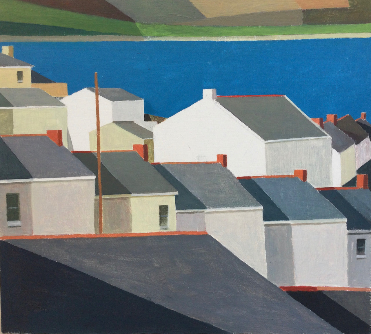 Artist Philip Lyons , view of grey terraced roof tops with blue sea and coastline in distance