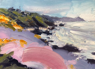 Tones of pink, grey and orange on the green headland with the white water lapping the dark rocks by artist Jill Hudson
