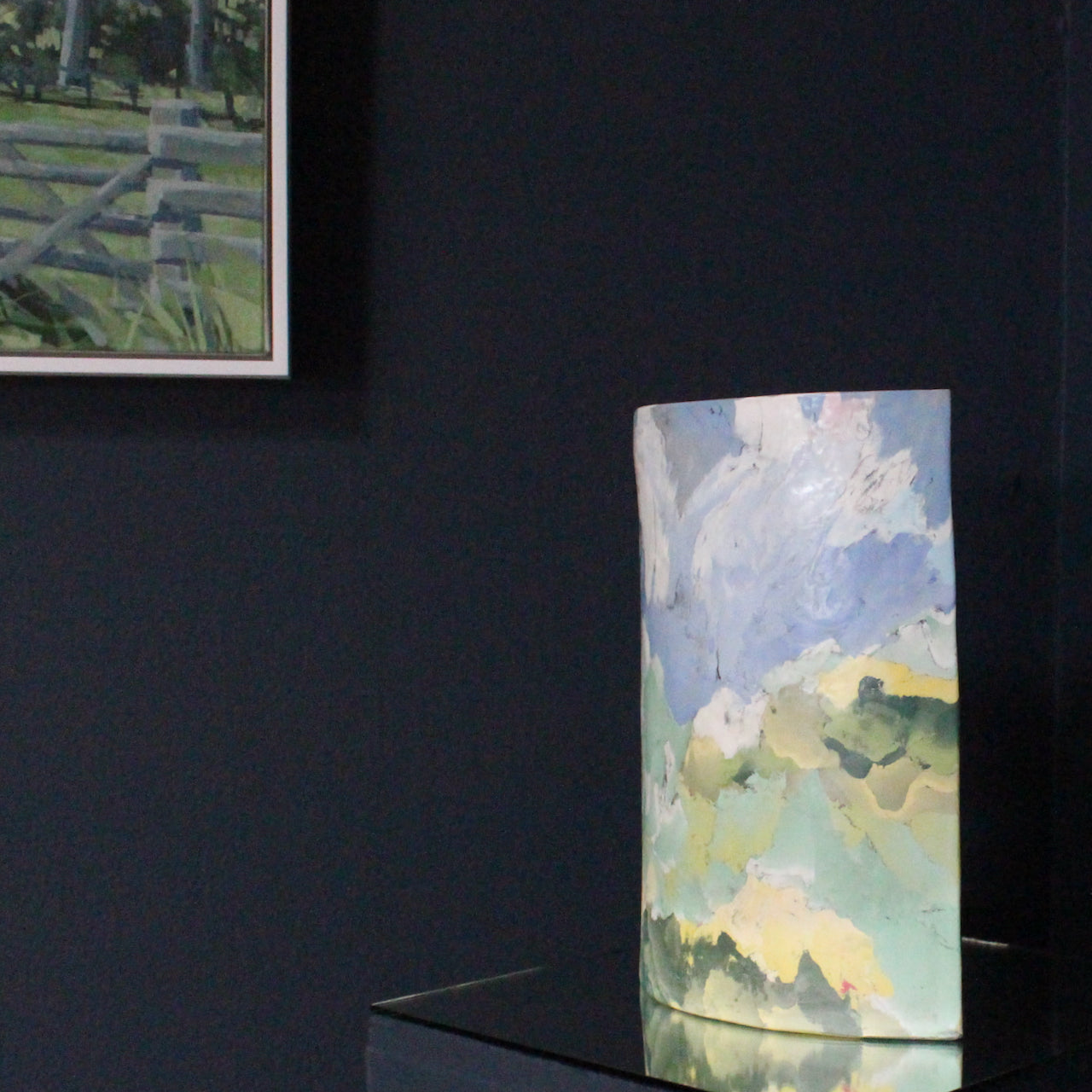 large eliptical shaped nerikomi ceramic vase with painted landscapeby UK ceramic artist Judy McKenzie