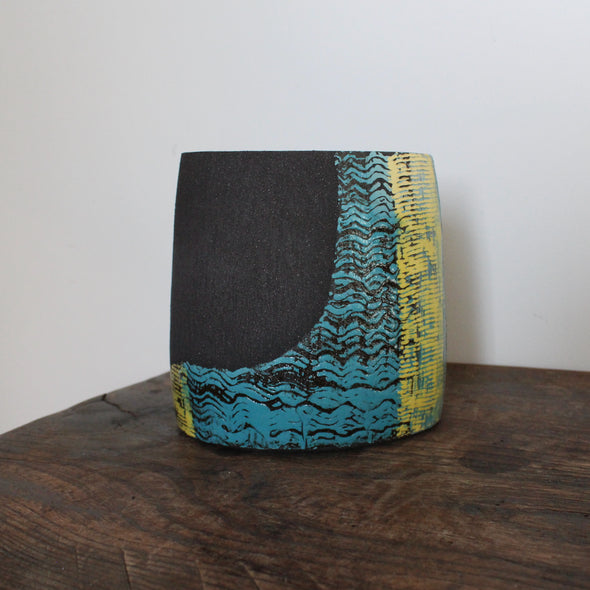Ceramic vessel with yellow and blue glaze by Cornish artist Anthea Bowen
