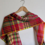 woollen hand-woven scarf in pinks, yellow and greens by textile artist Teresa Dunne